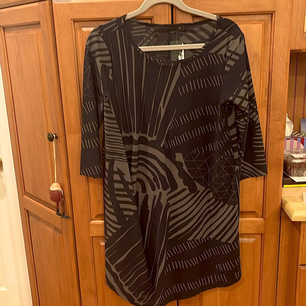 Porto San Francisco dress size S NYT
Porto size 1 is 8-10. Price drop